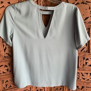 Greylin light blue top size Med.